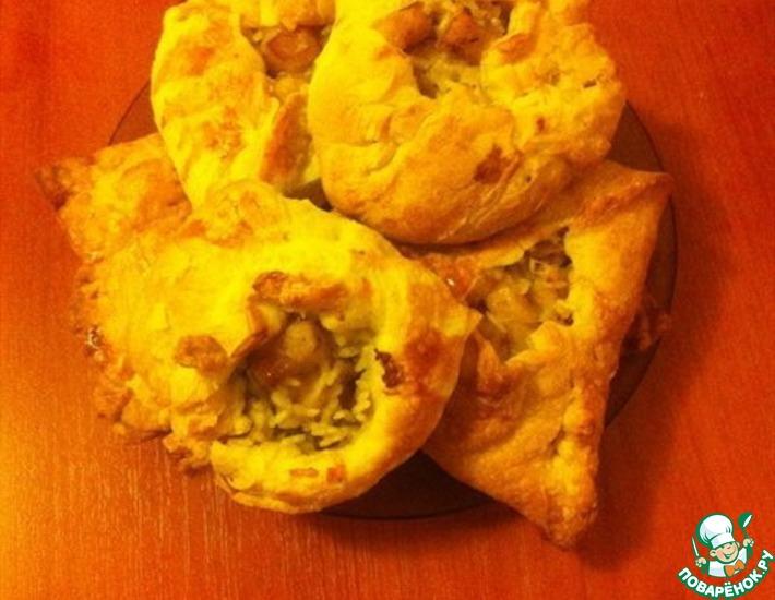 Рецепт: Пироги с пангасиусом из слоеного теста